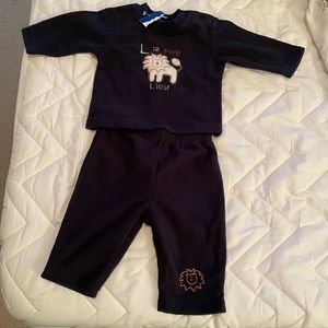 Two-piece navy blue jogging outfit in size 3 to 6 months.